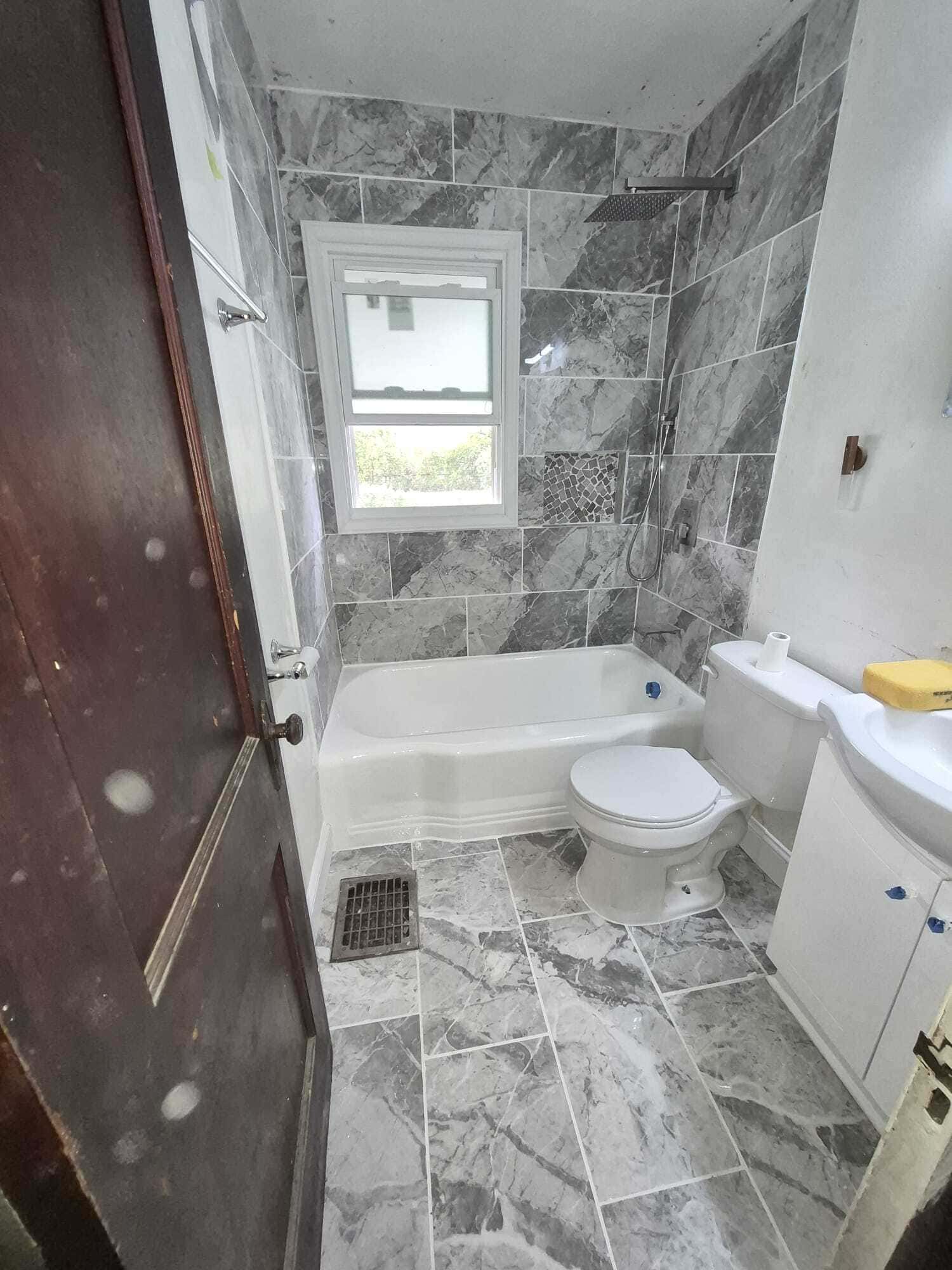 Marble Tile Shower & Bathtub Renovation